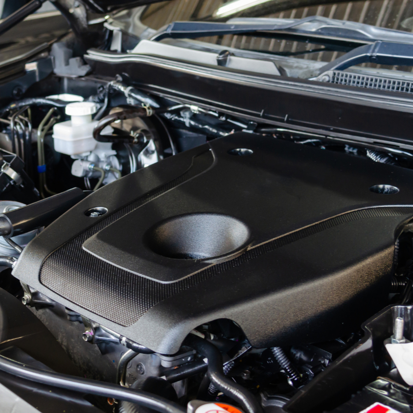 Engine bay cleaning and conditioning for optimal car performance.